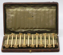 Load image into Gallery viewer, Set of Twelve Tiffany &amp; Co., 14kt. Gold and Bone Swizzle Sticks
