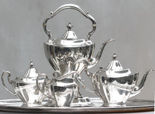 Load image into Gallery viewer, Reed And Barton Sterling Silver Four-Piece Tea And Coffee Service with a Tiffany &amp; Co. Silver Plated Tray