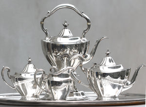 Reed And Barton Sterling Silver Four-Piece Tea And Coffee Service with a Tiffany & Co. Silver Plated Tray