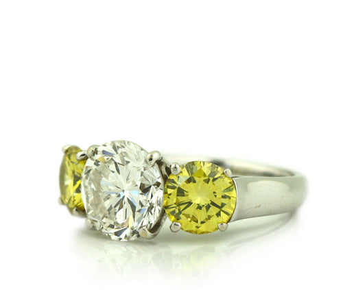 Platinum, Yellow Diamond and Diamond Three Stone Engagement Ring