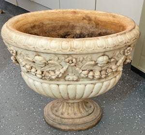 Large 19th Century White Marble Oval Urn with Cherub Motif