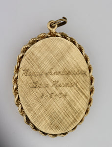 A Gold, Ruby and Diamond Locket