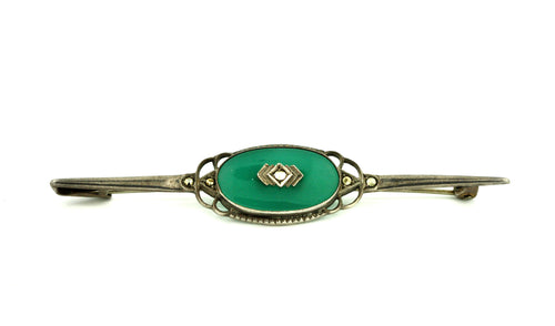 A Silver and Colored Stone Brooch