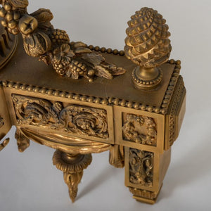 Louis XVI style ormolu chenets