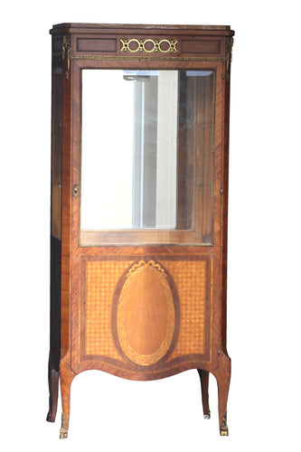 A gilt-bronze mounted burr amboyna and mahogany vitrine cabinet