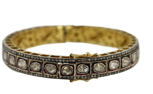 TWO-COLOR GOLD AND DIAMOND BANGLE-BRACELET