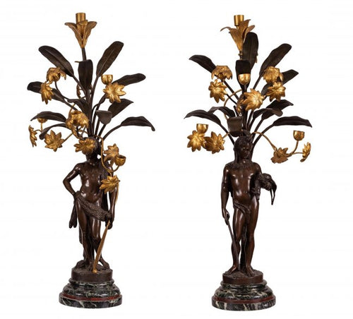 A Very Fine Pair of French Parcel-Gilt Bronze Figural six-light Candelabra